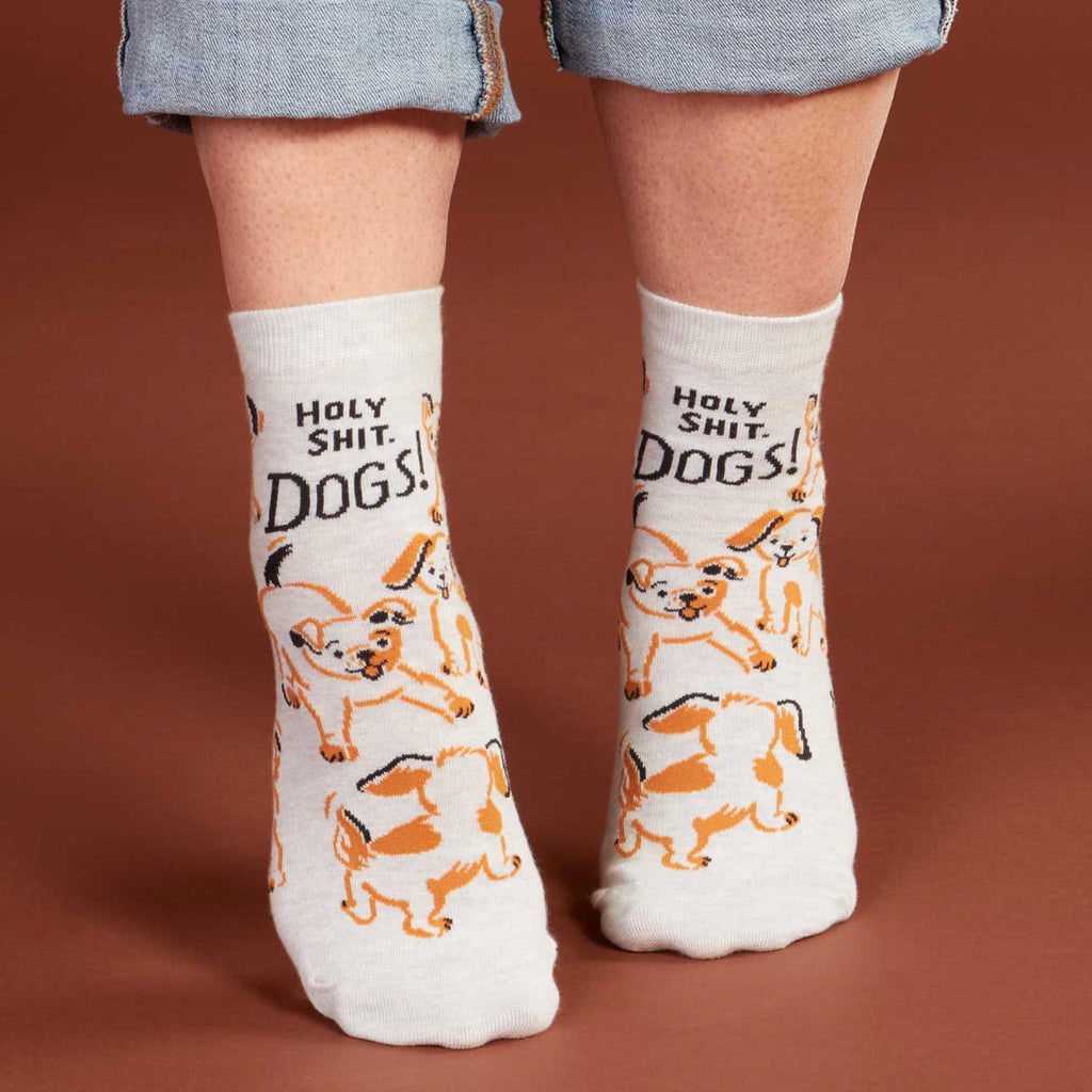 Person wearing Holy Shit. Dogs! Ankle Socks.
