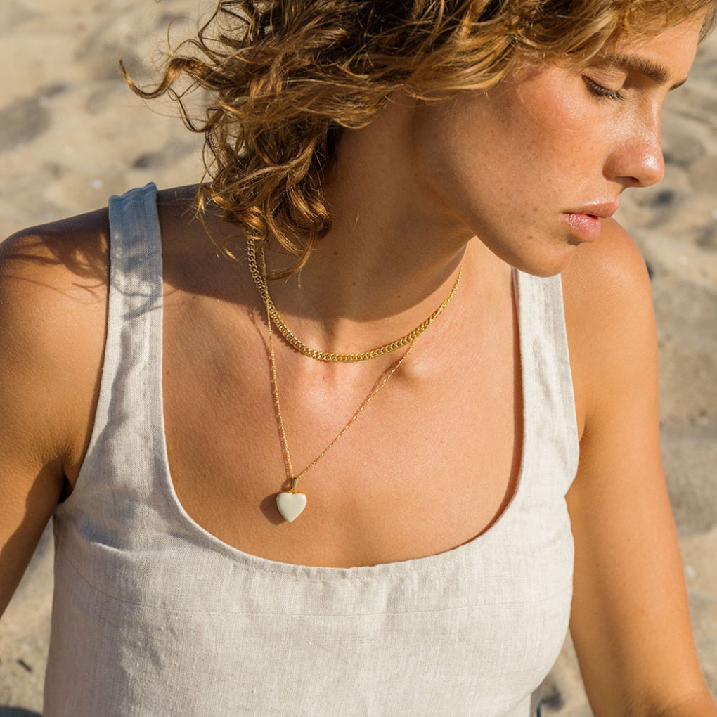 Person wearing Large Enamel Heart Locket Beige.