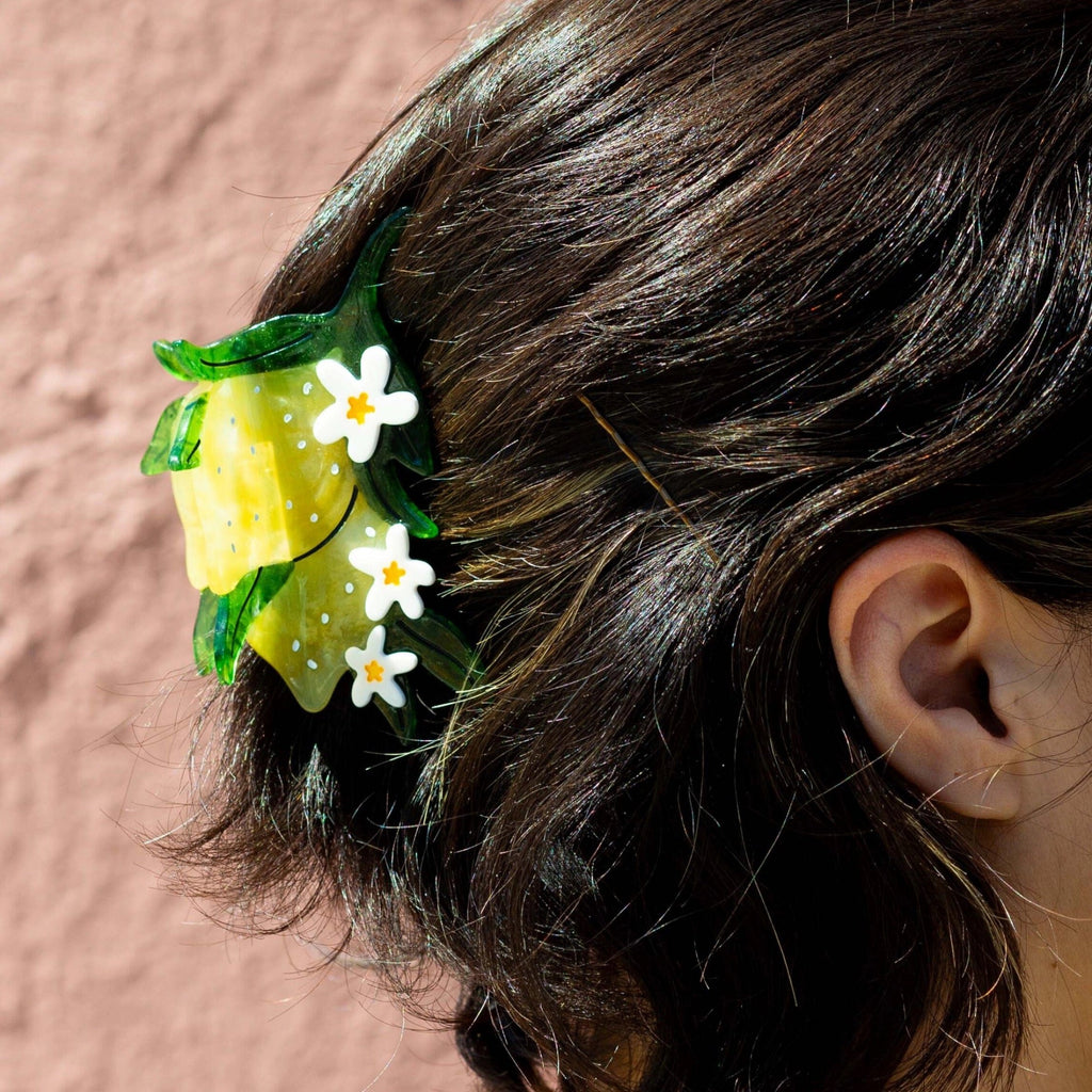 Person wearing Lemon and Flowers Hair Claw.