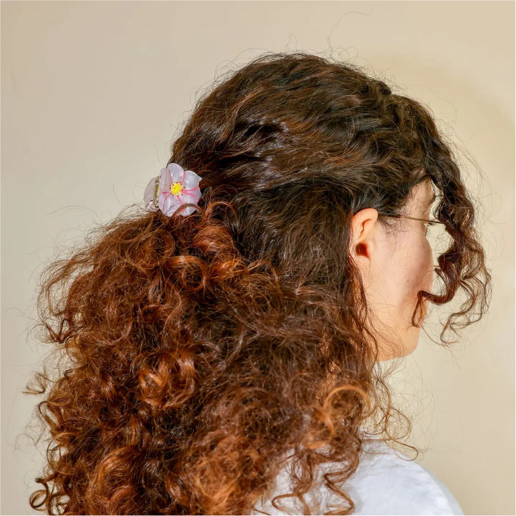 Person wearing Mini Cherry Blossom Hair Claw.