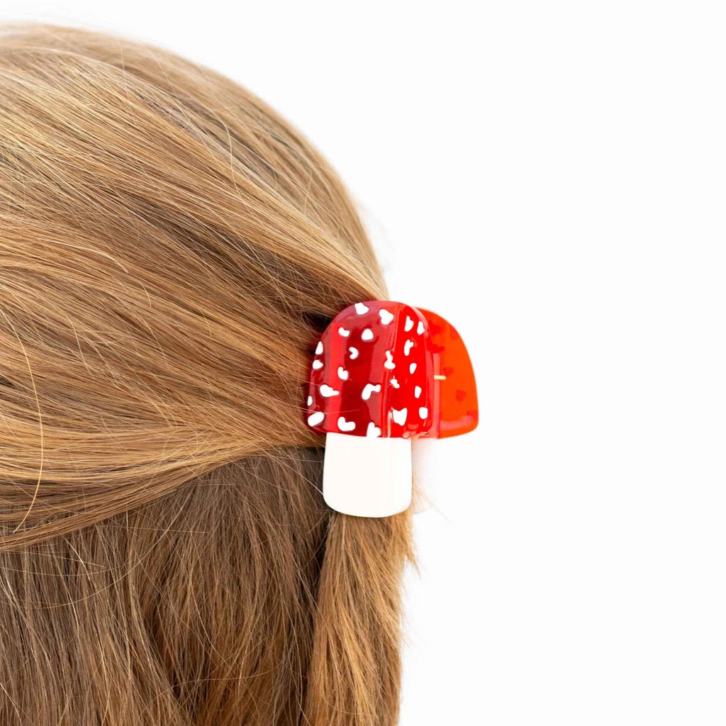 Person wearing Mini Mushroom Hair Claw.