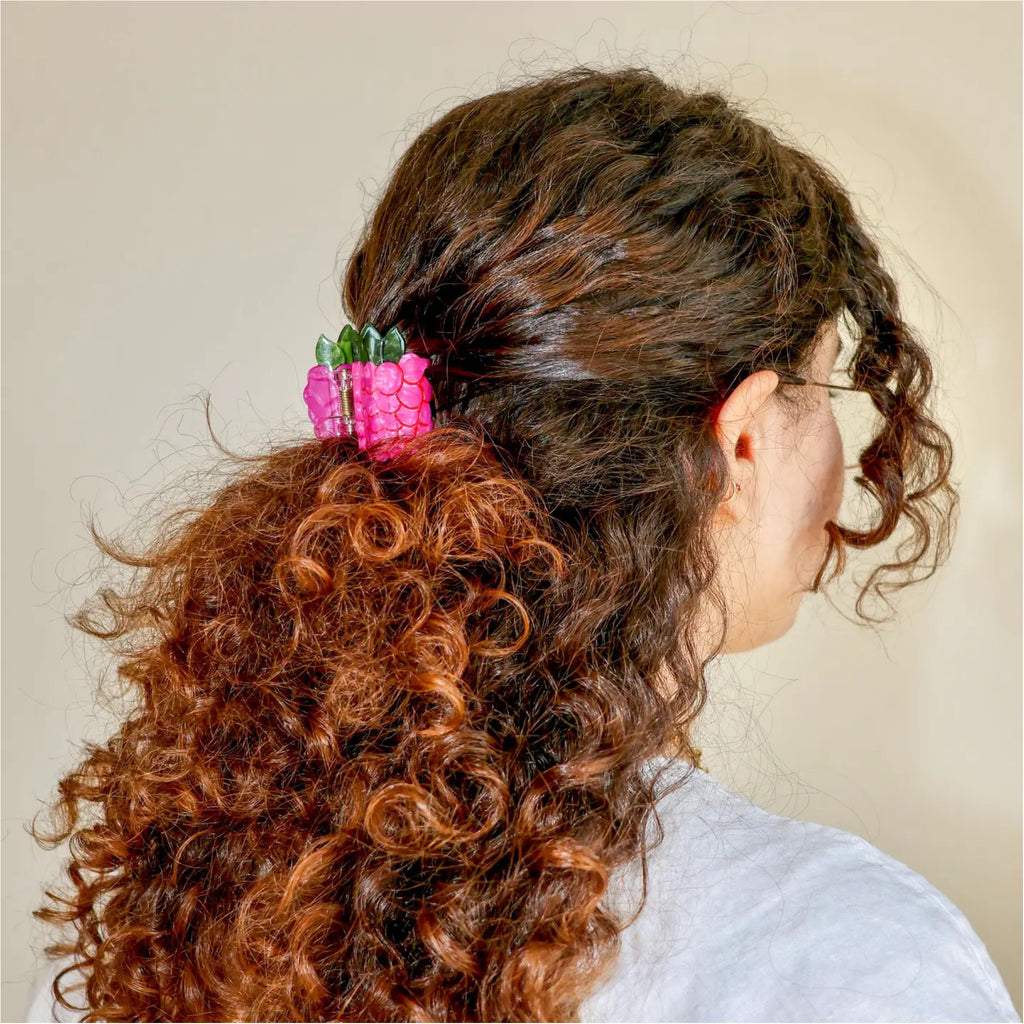 Person wearing Mini Raspberry Hair Claw.
