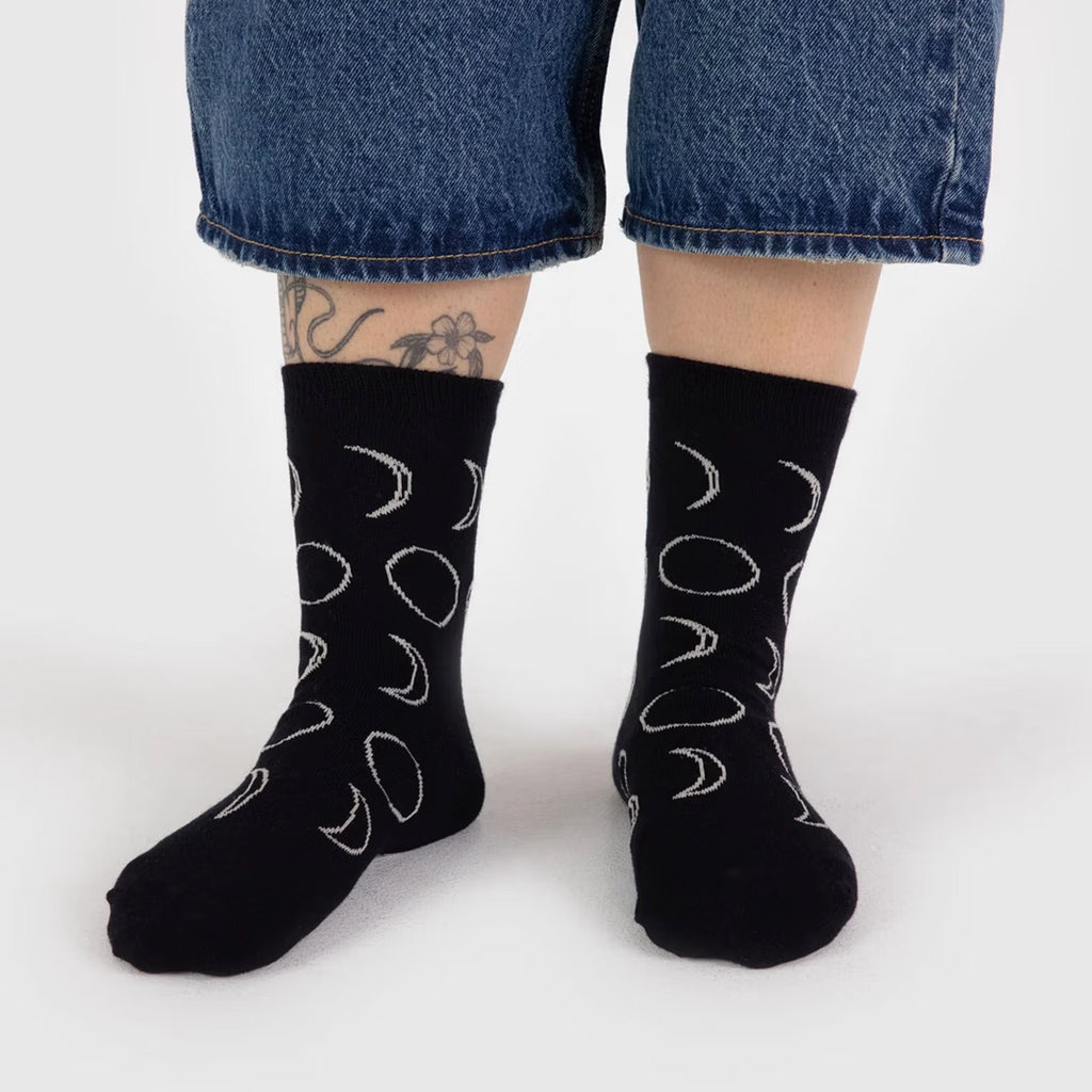 Person wearing Moon Crew Socks.