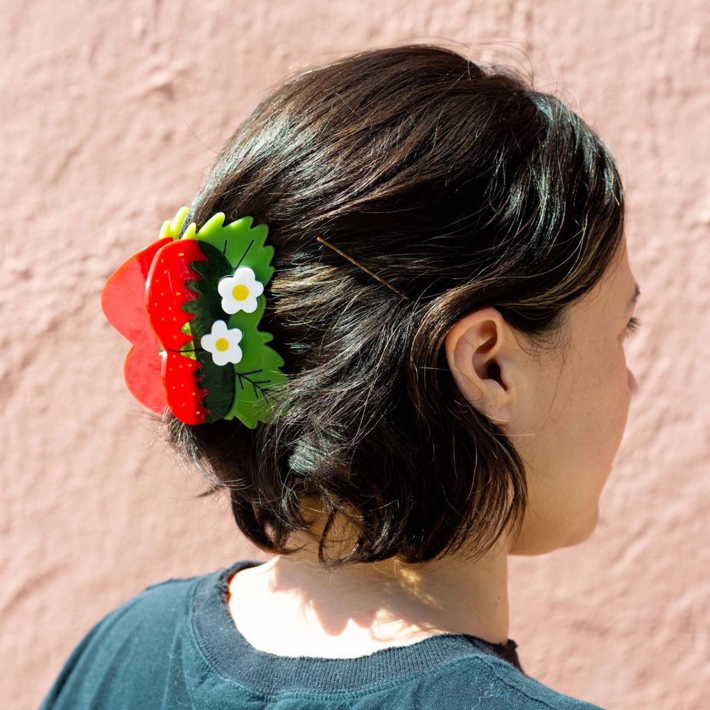 Person wearing Strawberries and Flowers Hair Claw.