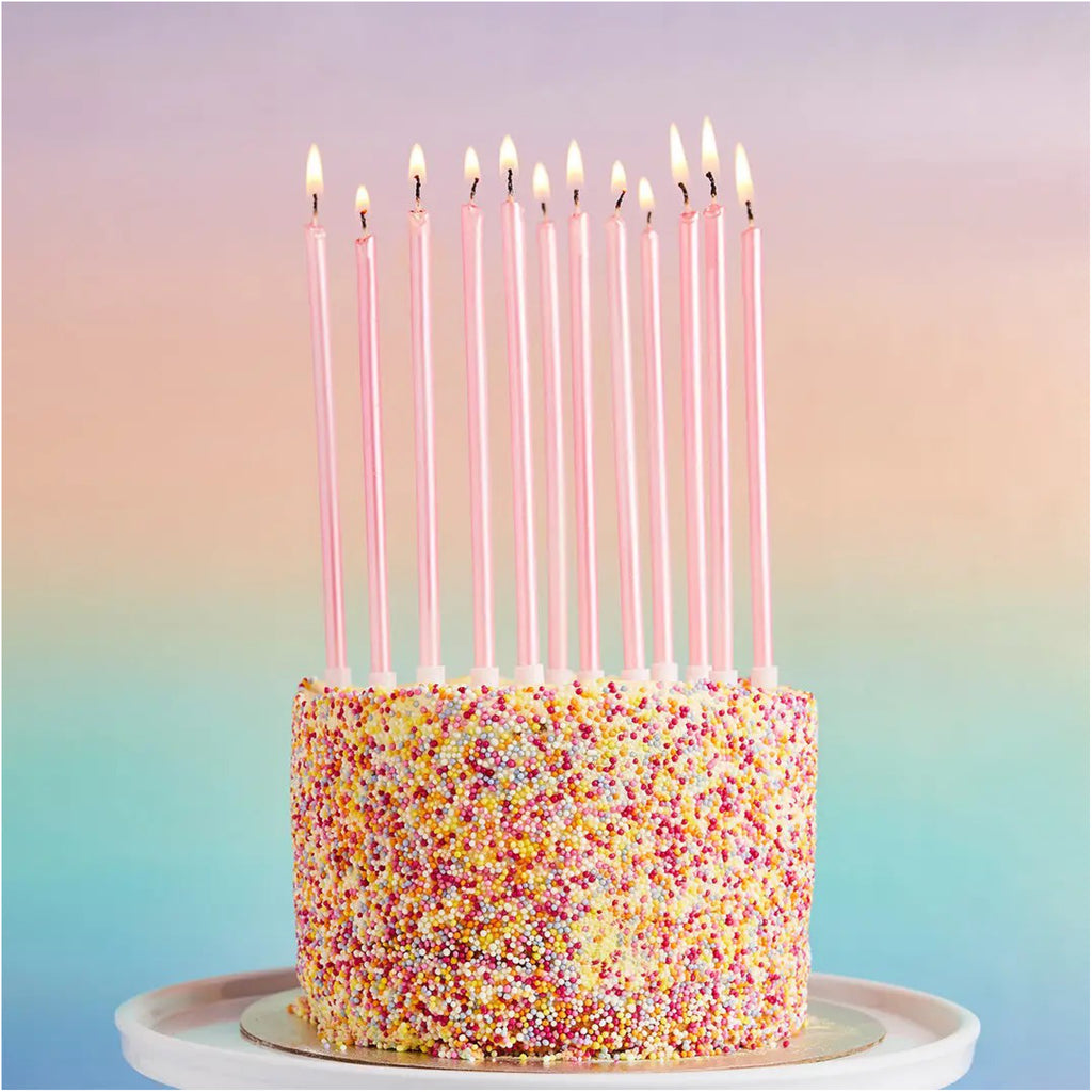 Pink Tall Skinny Birthday Candles on cake.