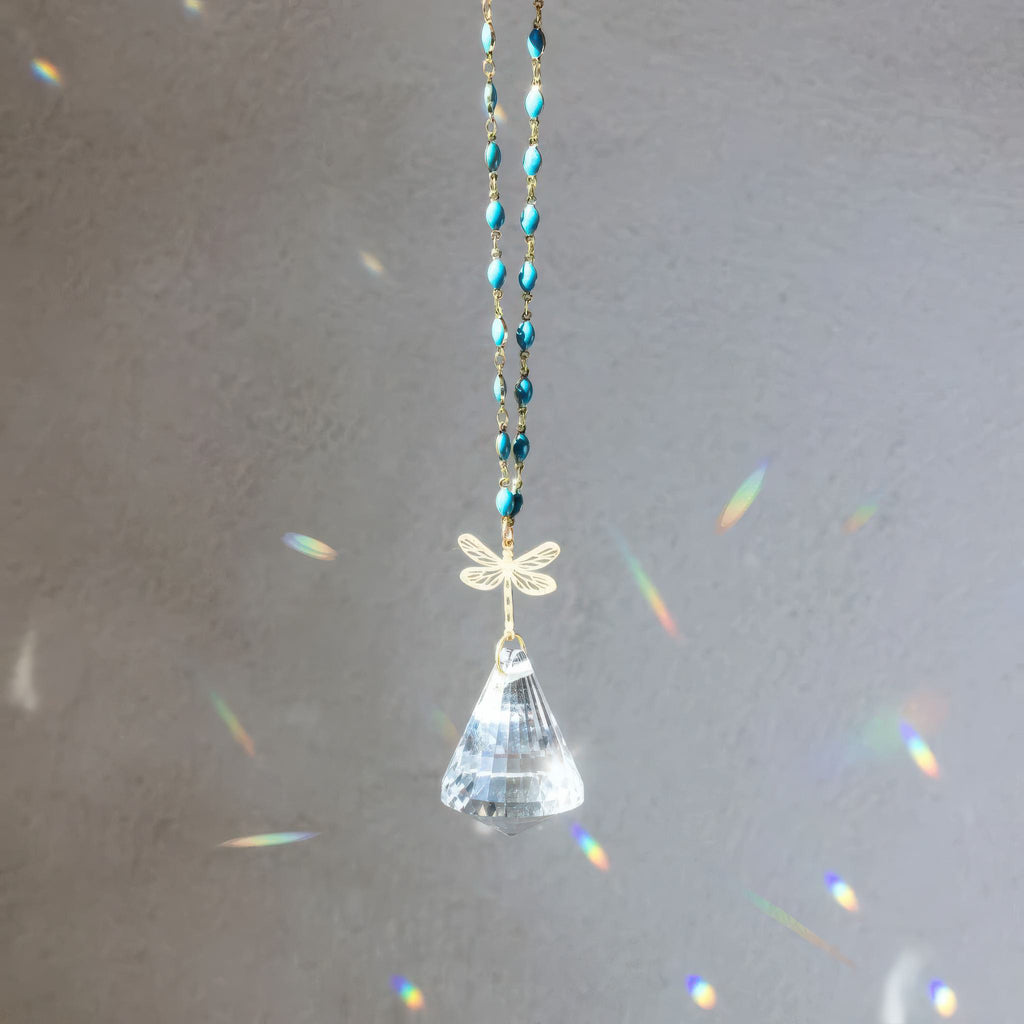 Pocket Suncatcher Dragonfly in window.