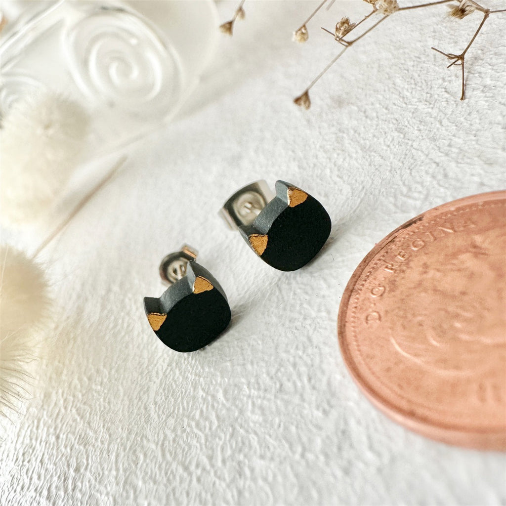 Porcelain Cat Face Stud Earrings Black besides penny.