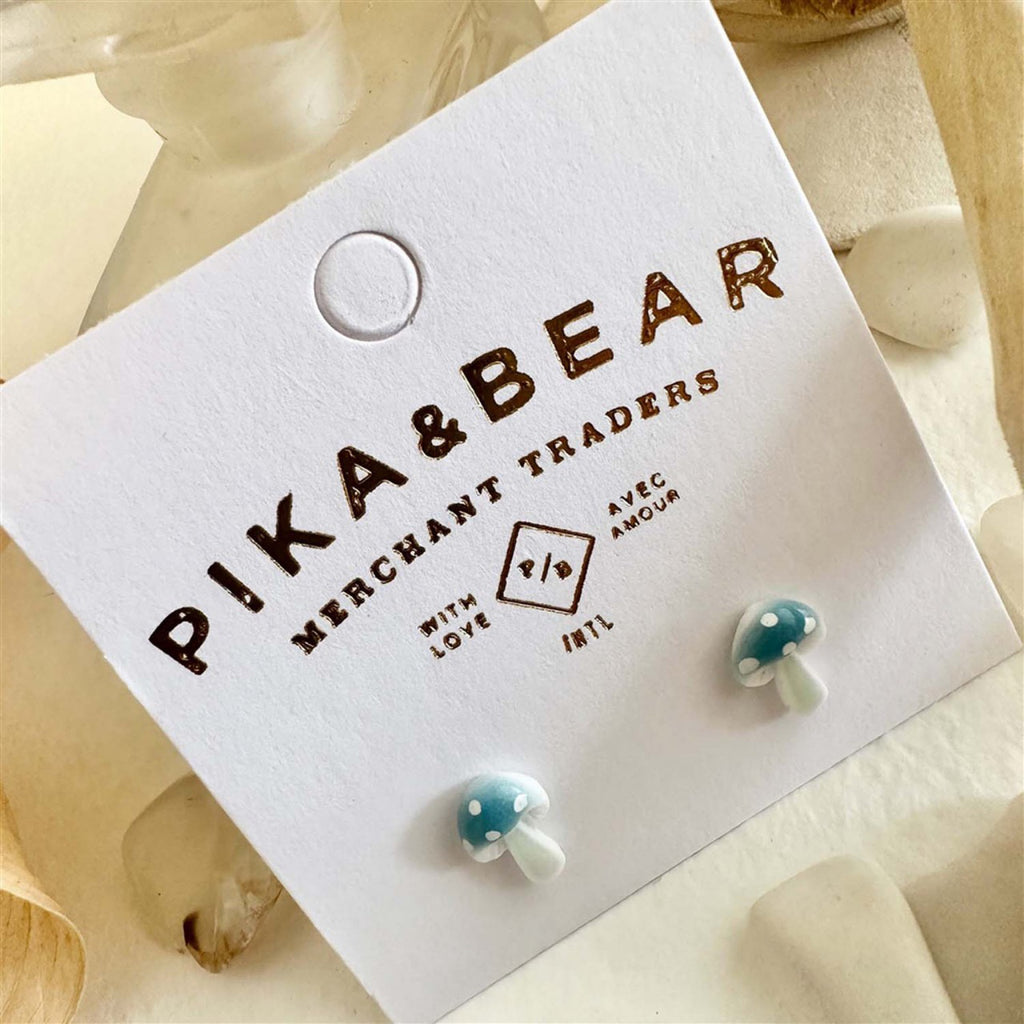 Porcelain Mushroom Stud Earrings Blue packaging.