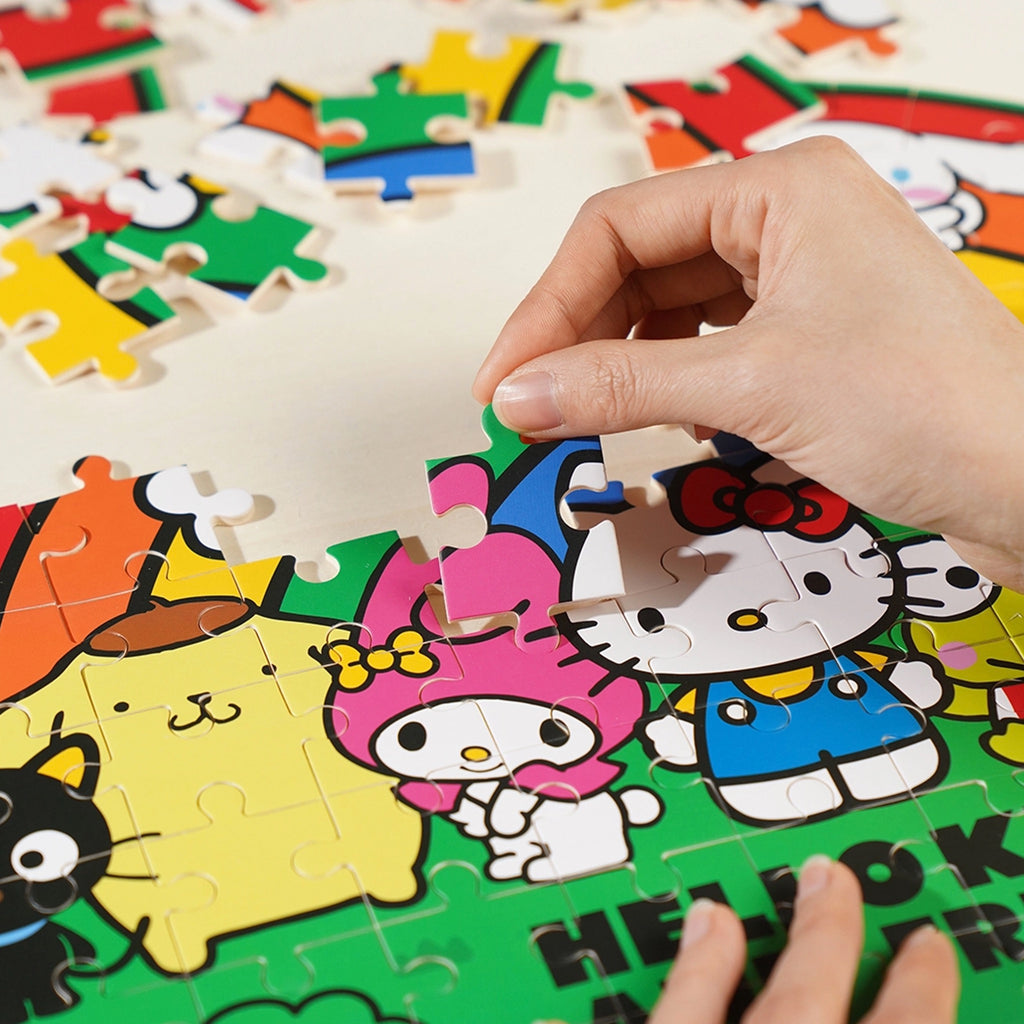 Rainbow Hello Kitty And Friends Wooden Jigsaw Puzzle in use.
