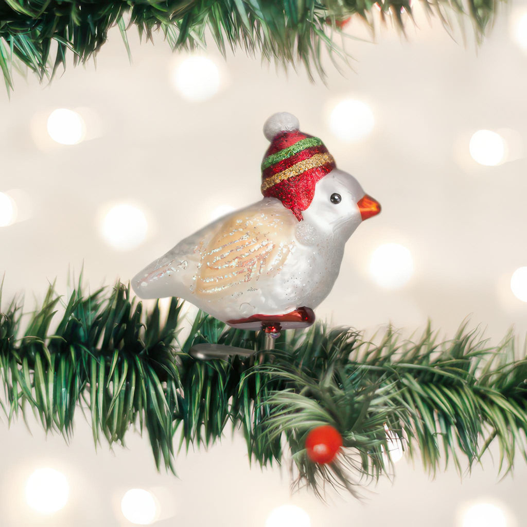 Red Hat Snowbird Ornament in tree.