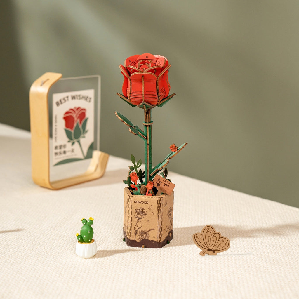 Red Rose 3D Wooden Flower Puzzle on table.