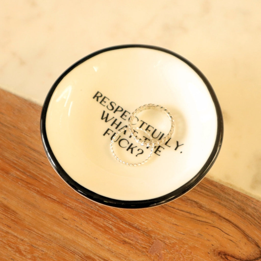 Respectfully, What The Fuck? Ring Dish on table.