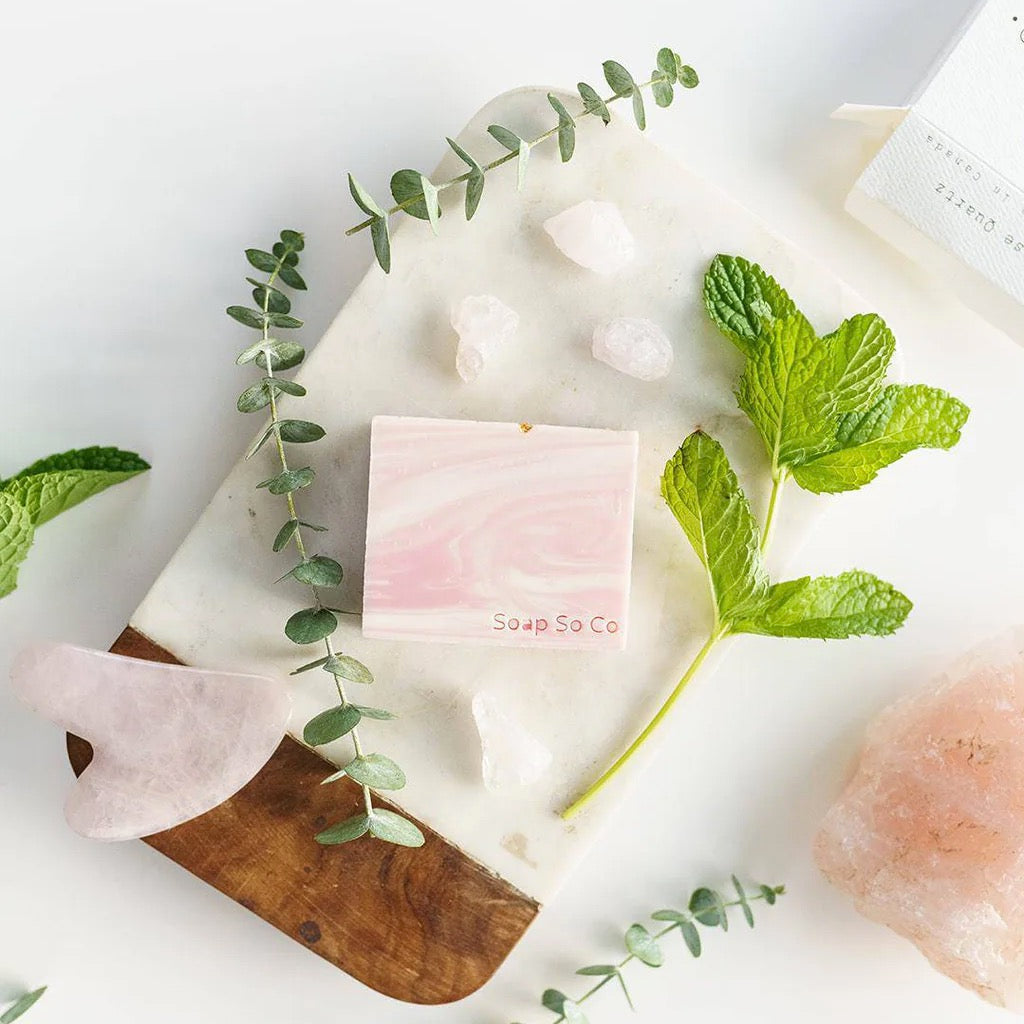 Rose Quartz Soap Bar on table.