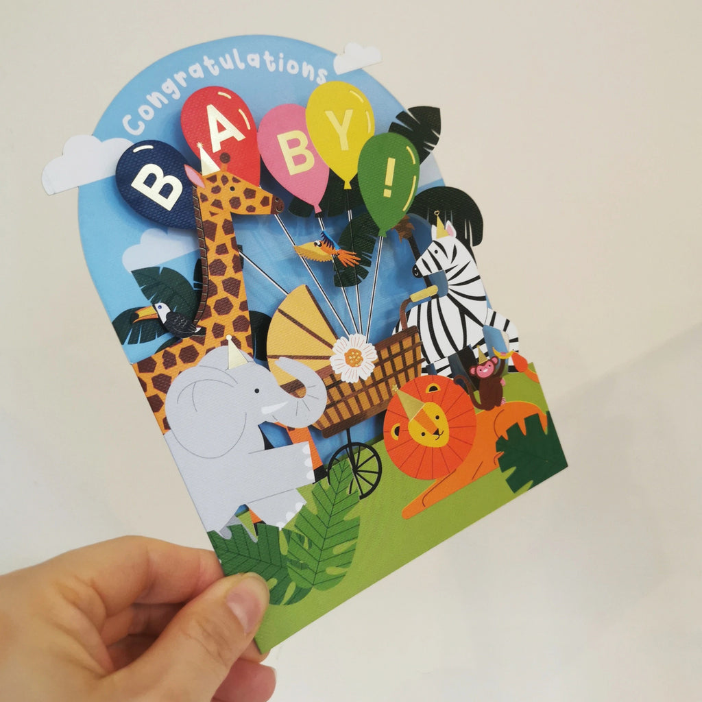 Safari Animals Laser Cut Baby Card in hand.