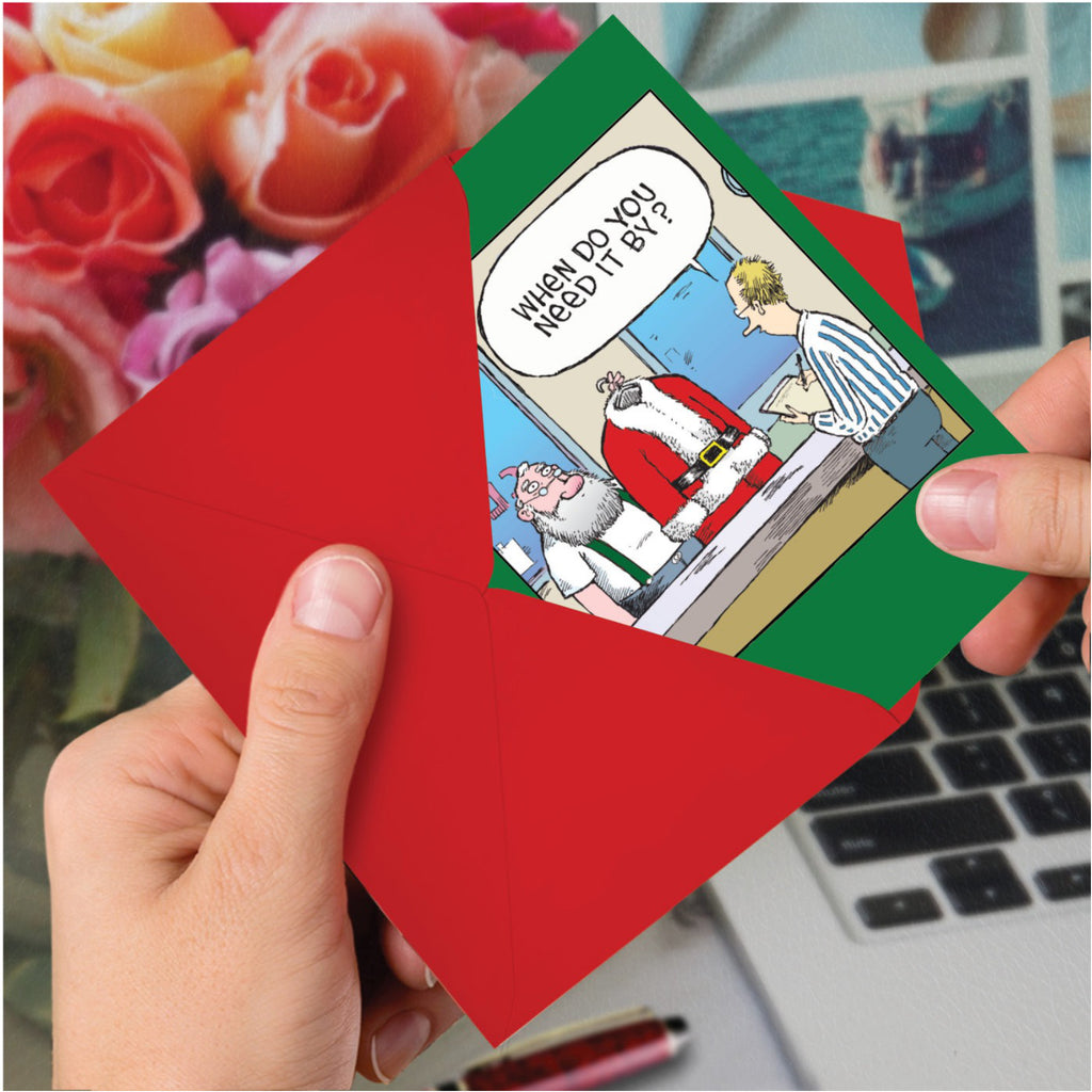 Santa Suit Christmas Card in hand.