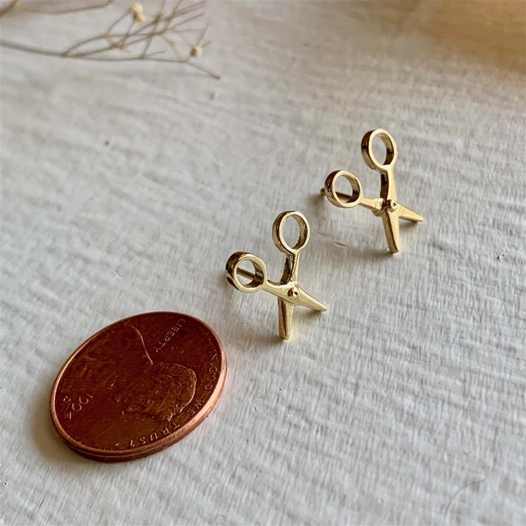 Scissor Stud Earrings Gold with penny.