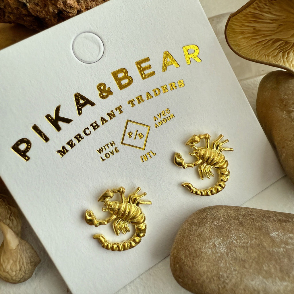 Scorpion Stud Earrings Brass packaging.