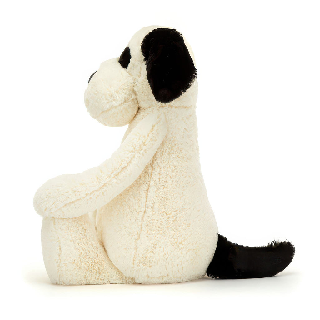 Side of Bashful Black & Cream Puppy Original.