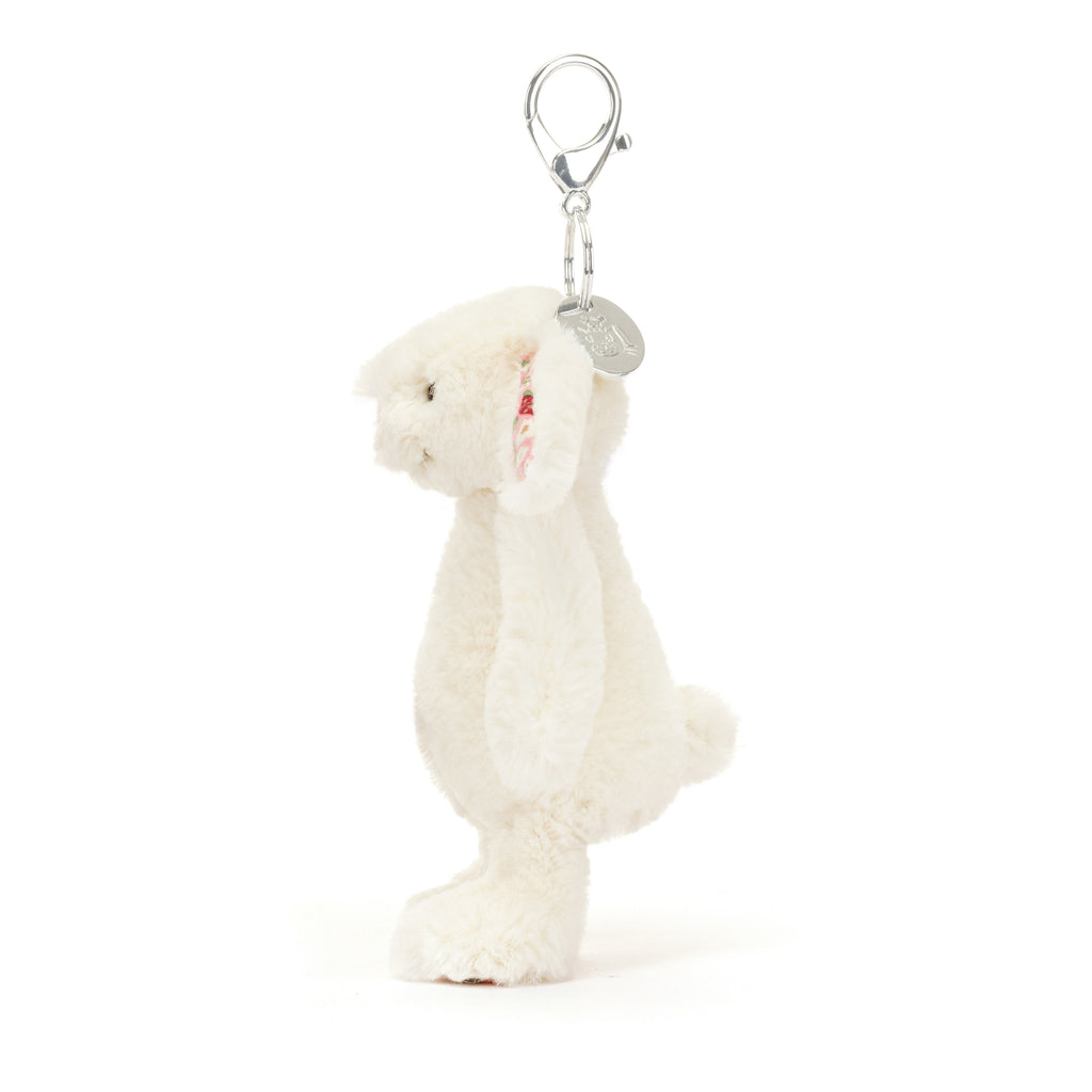 Side of Jellycat Blossom Cream Bunny 'Berry' Bag Charm.