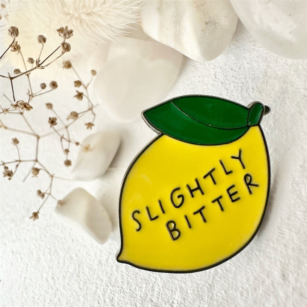 Slightly Bitter Lemon Enamel Pin.