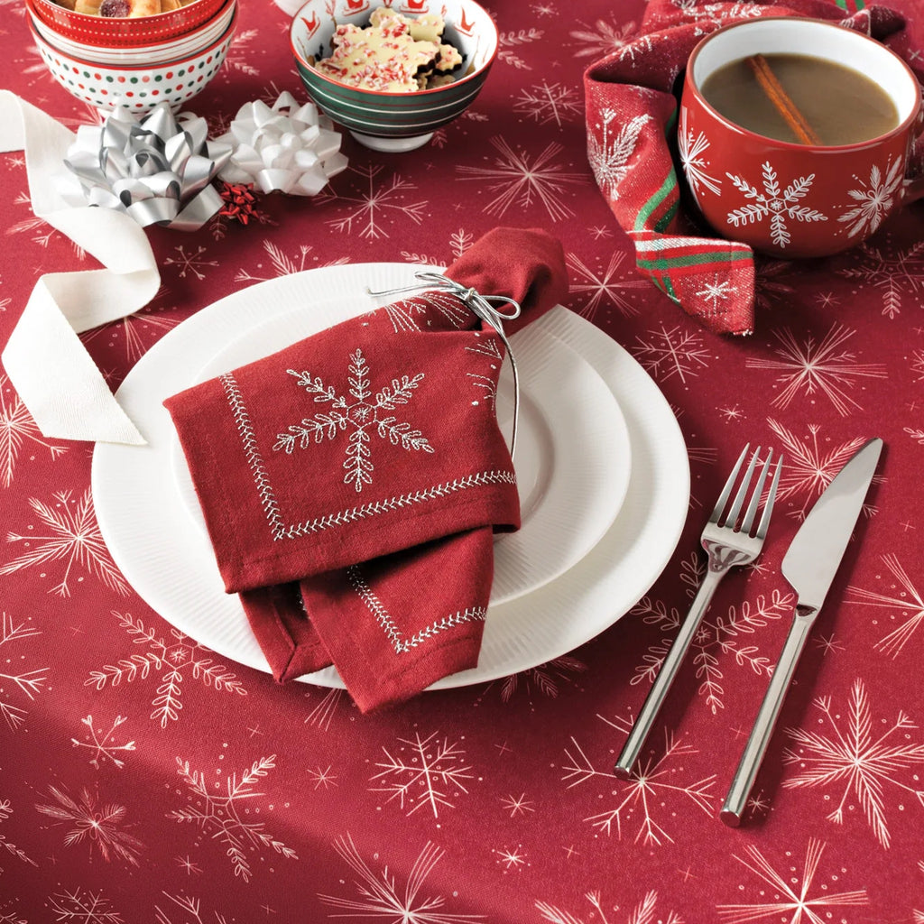 Snowflakes Latte Mug on table.