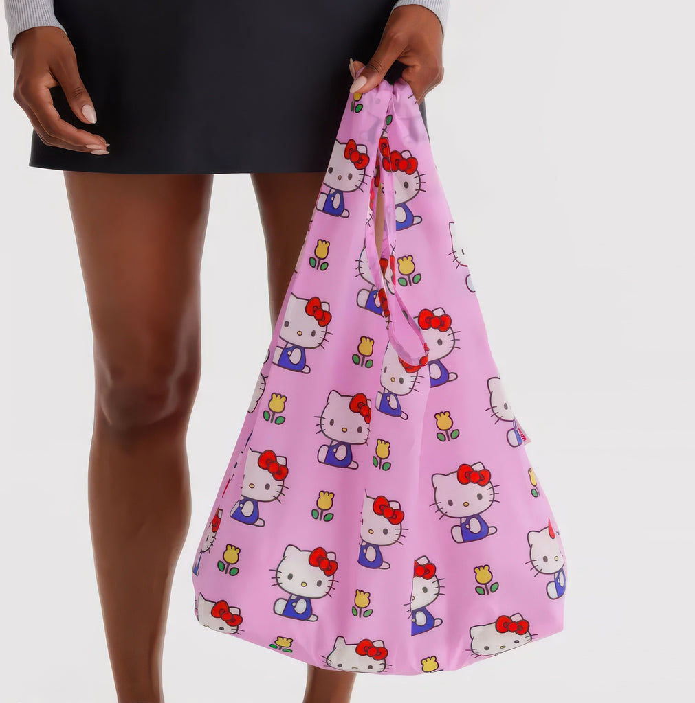 Standard Baggu Hello Kitty Pink in hand.
