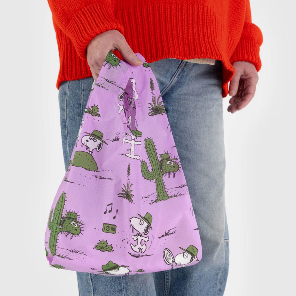 Standard Baggu Pink Spike Snoopy Person using.