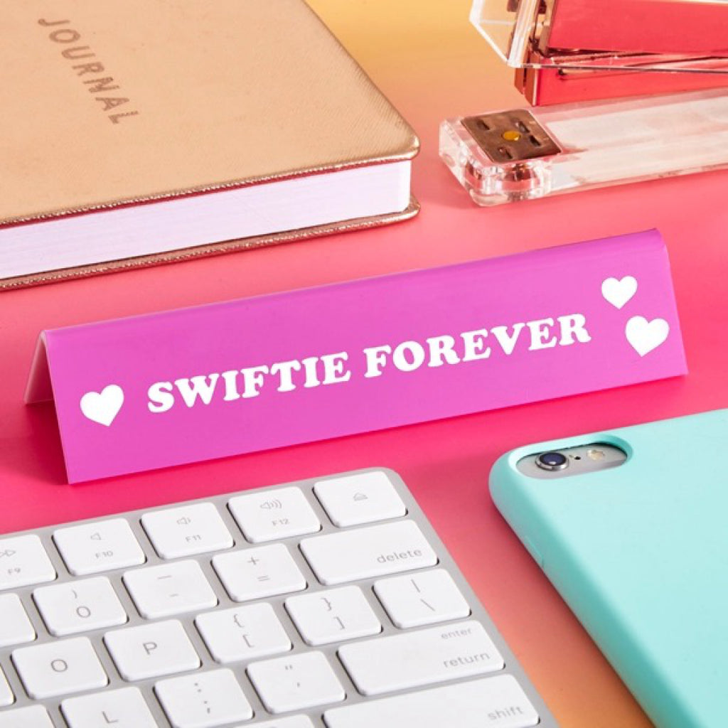 Swiftie Forever Desk Sign on table.