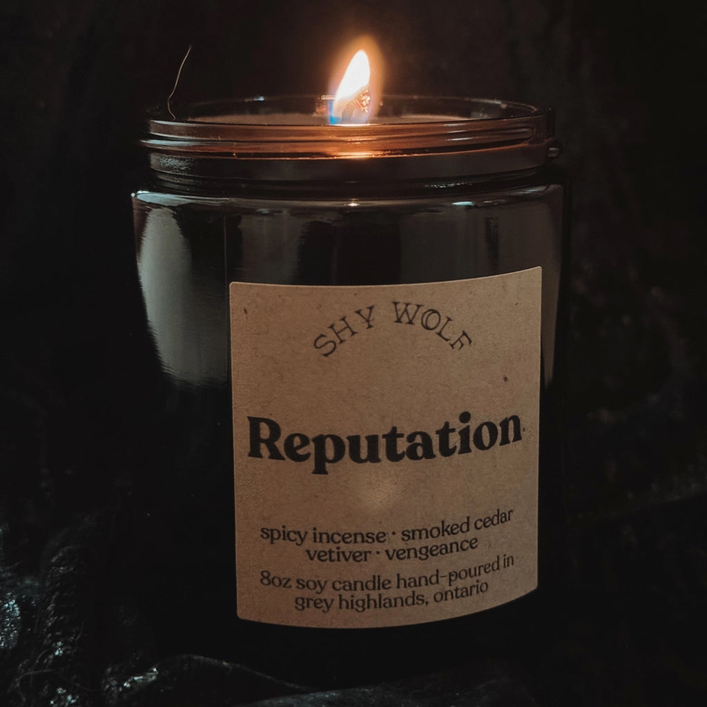 Taylor Swift Reputation Tarot Soy Wax Candle burning.