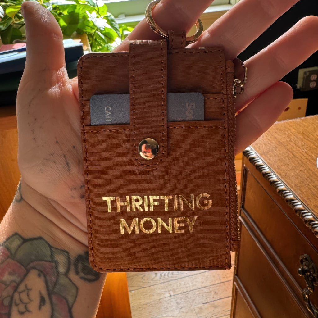 Thrifting Money Keychain Wallet being held.