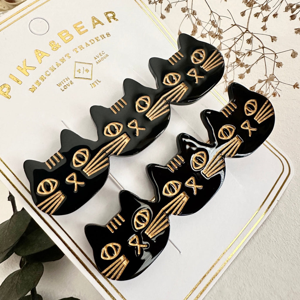 Triple Cat Face Hair Clips Black packaging.