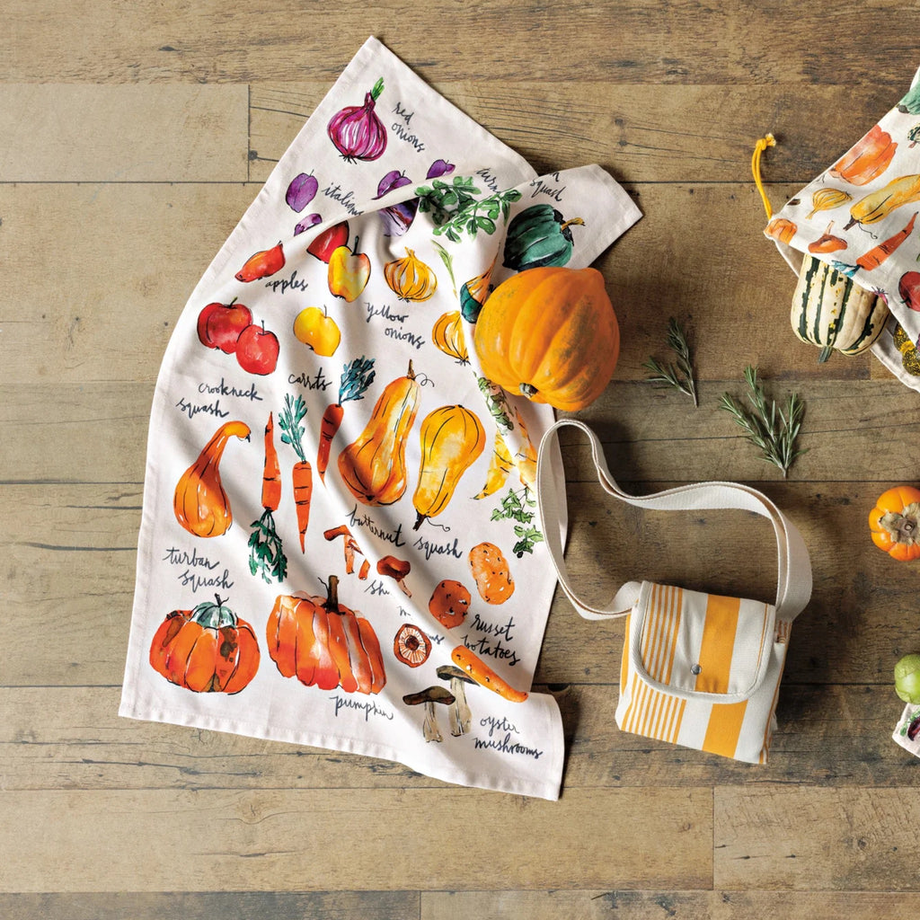 Veggie Stand Printed Cotton Dishtowel on table.