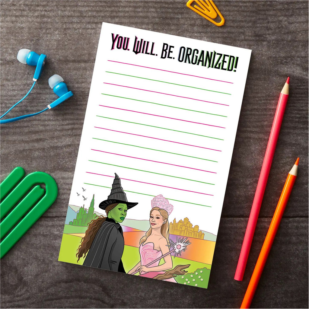 Wicked You Will Be Organized Notepad on table.