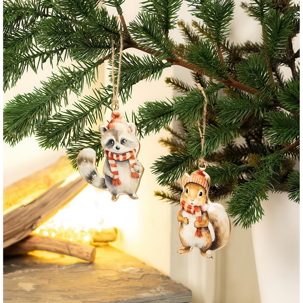 Winter Raccoon Metal Ornament in tree.