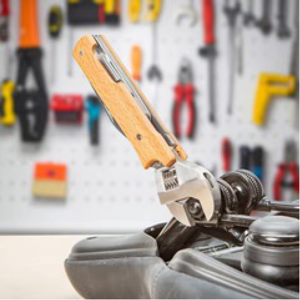 Wooden Wrench Multi-Tool being used.