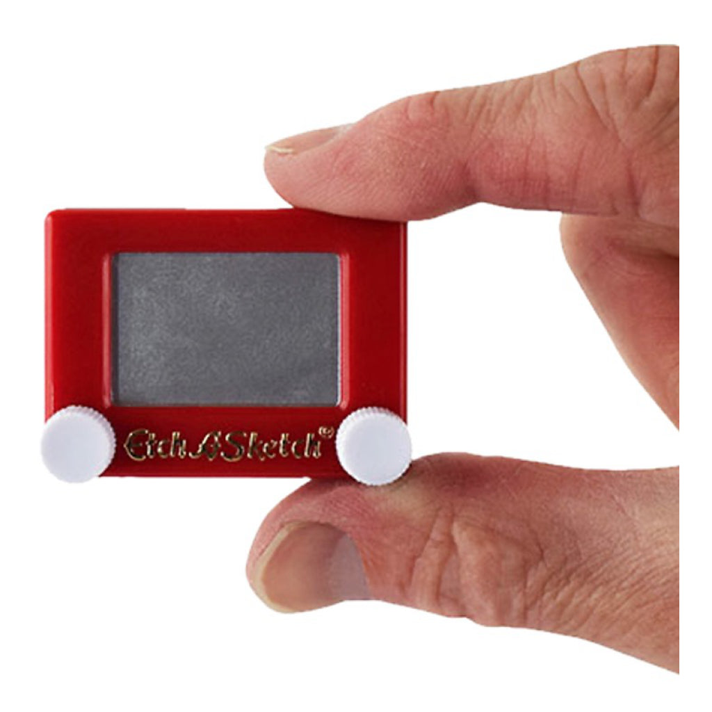 World's Smallest Etch a Sketch in hand.