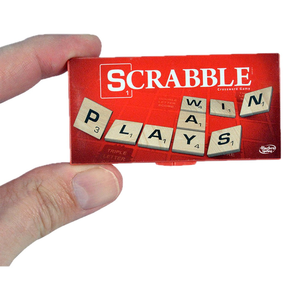 World's Smallest Scrabble in hand.
