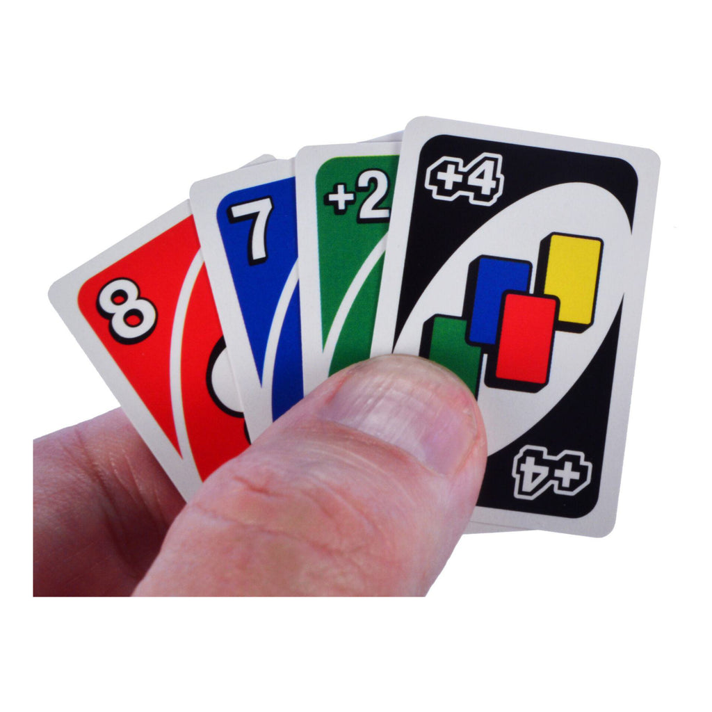 World's Smallest Uno in hand.
