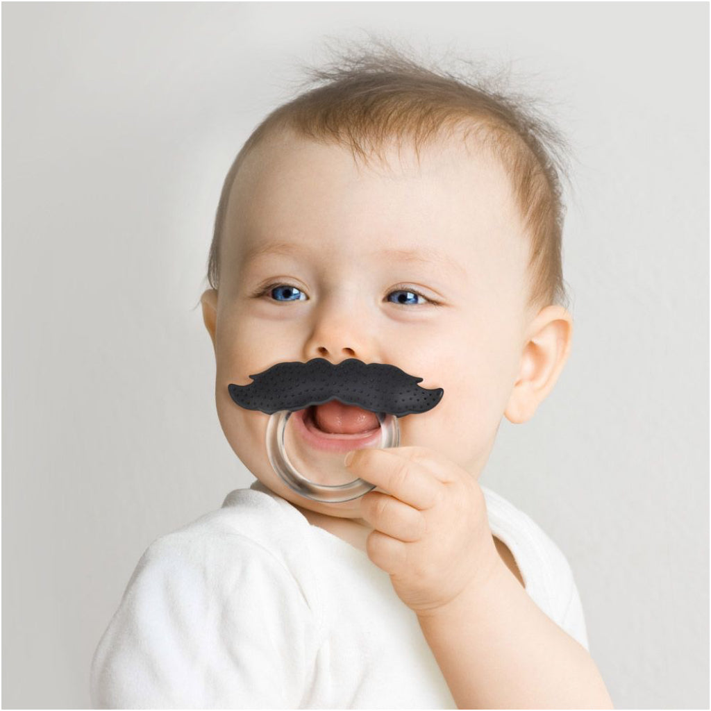 https://outerlayer.com/cdn/shop/products/Baby_using_Chill_Baby_Mustache_Pacifier.jpg?v=1531324989