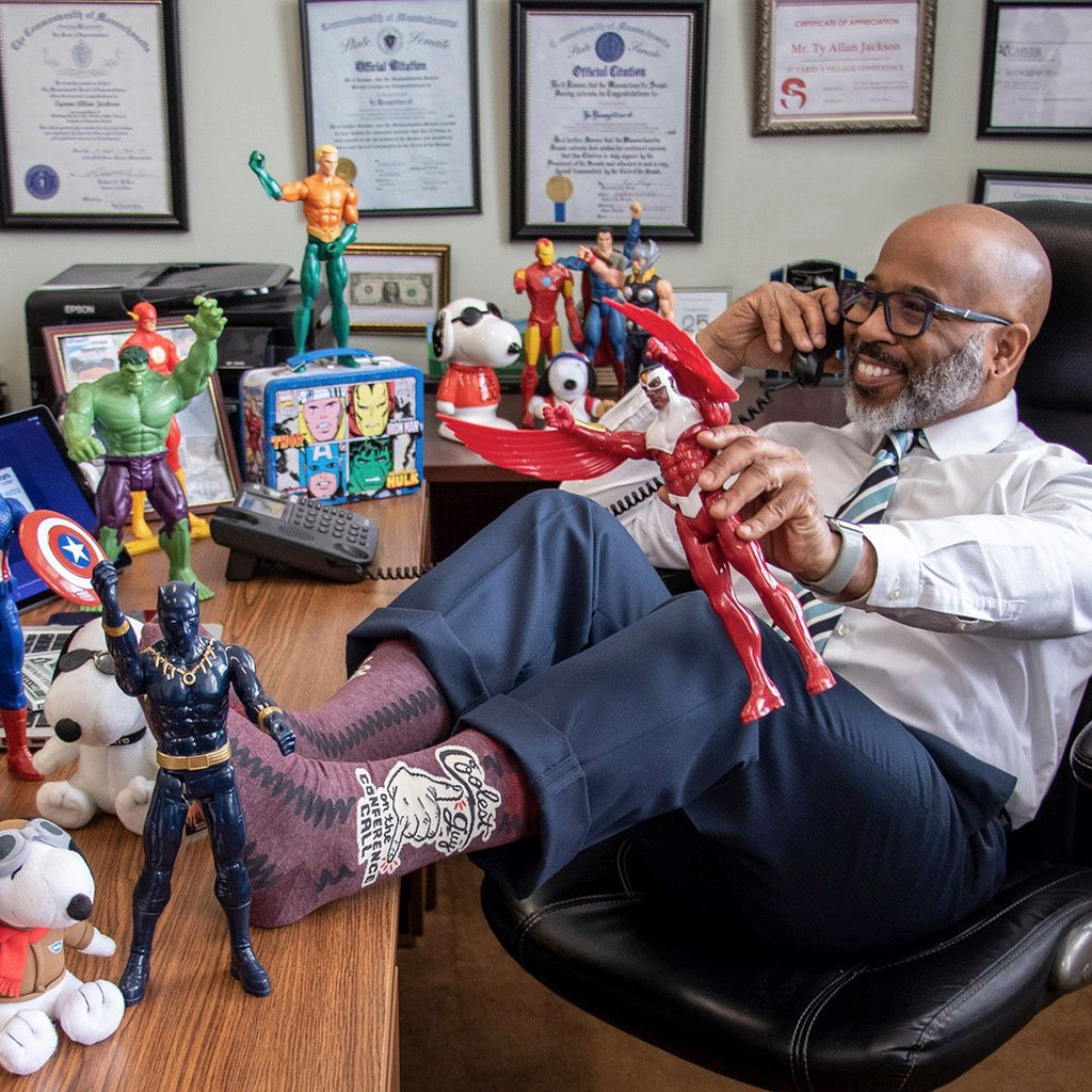 Lifestyle shot of Coolest Guy Men's Socks.