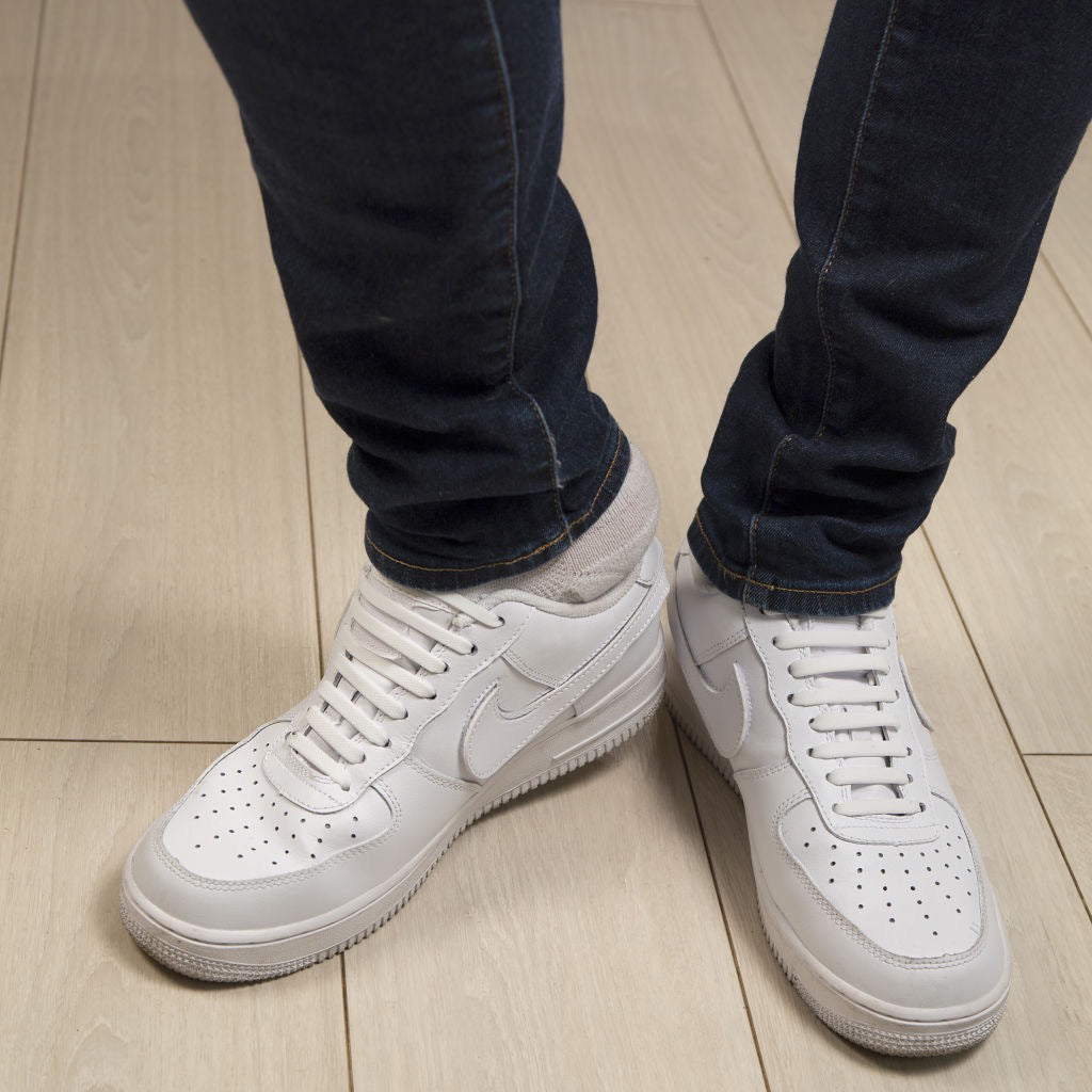 White No-Tie Shoe Bands In Use
