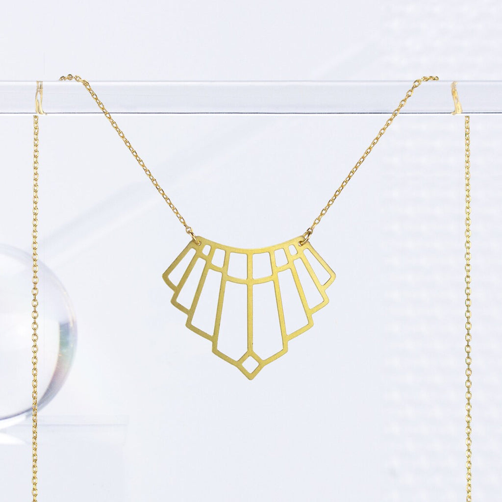 Art Deco Arch Necklace Gold on rail.
