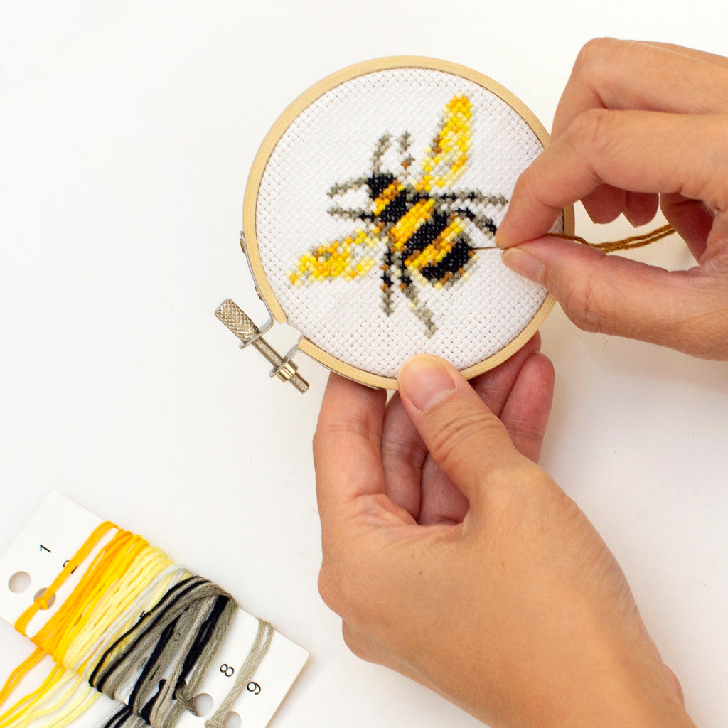 Bee Mini Cross Stitch Embroidery Kit in use.