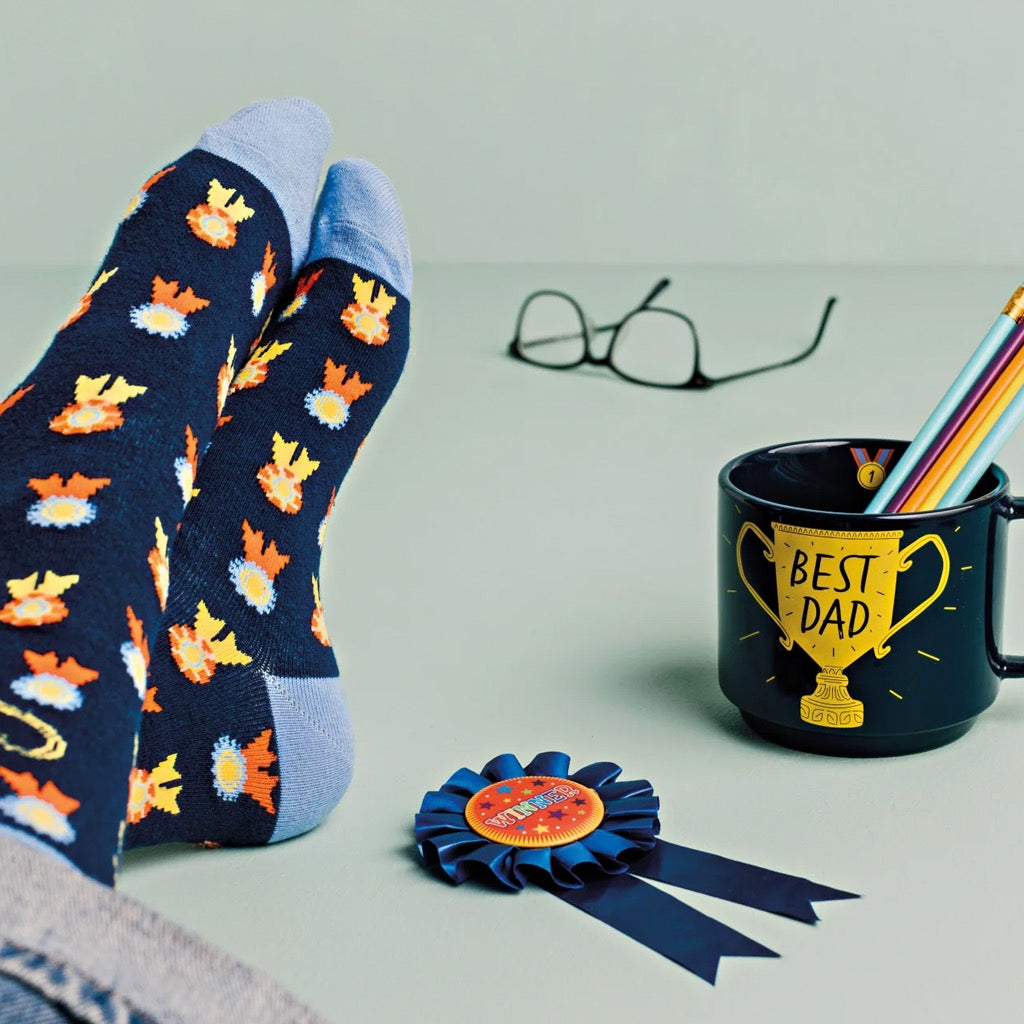 Best Dad Mug & Socks Set on table.