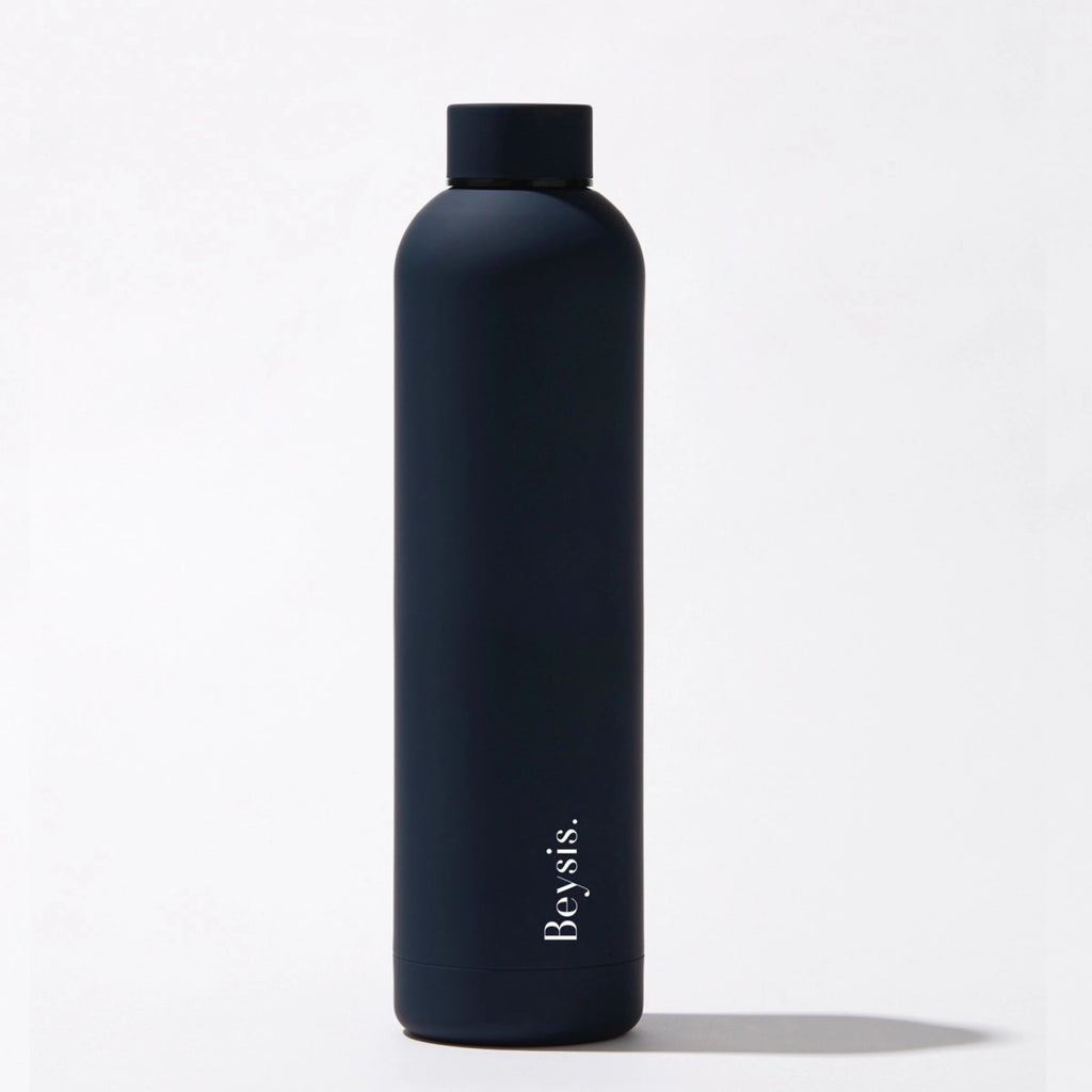 Beysis Water Bottle on surface.