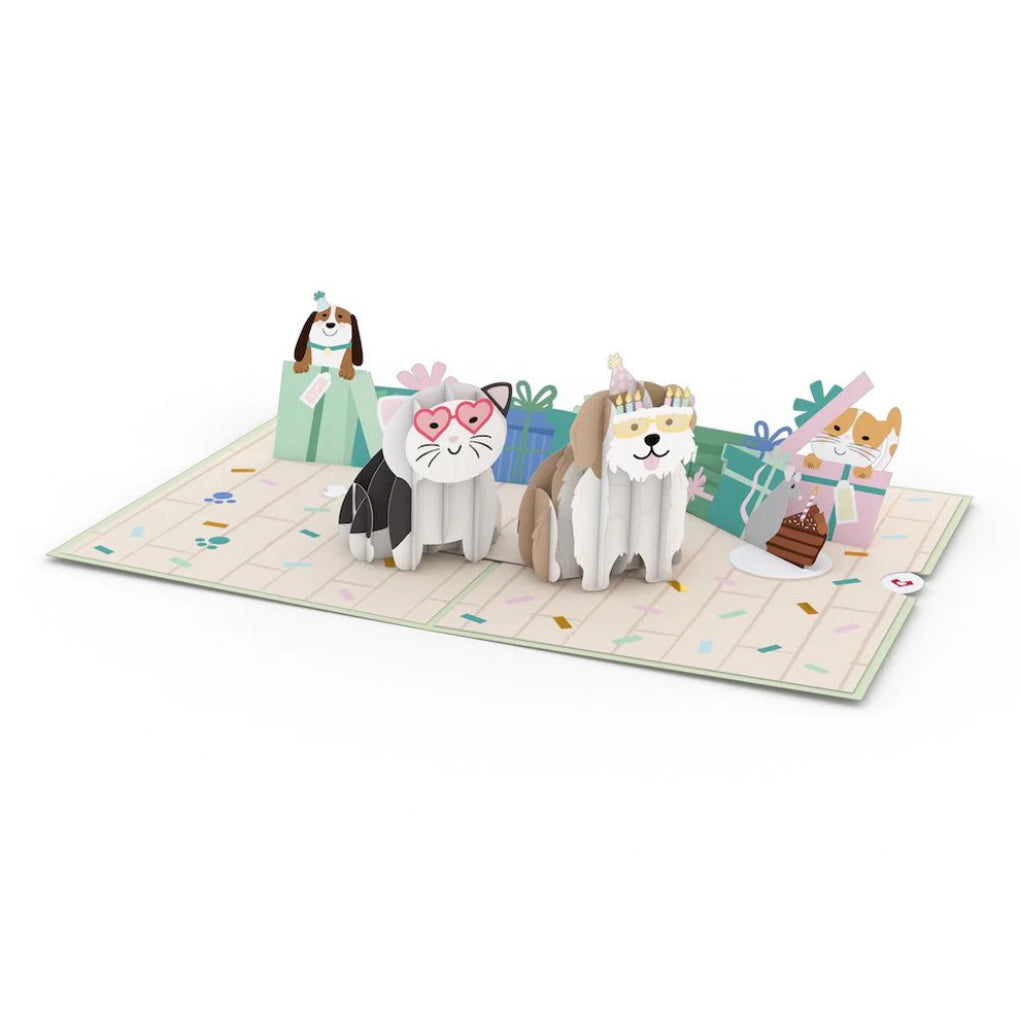 Birthday Cats and Dogs Pop-Up Card flat on table.