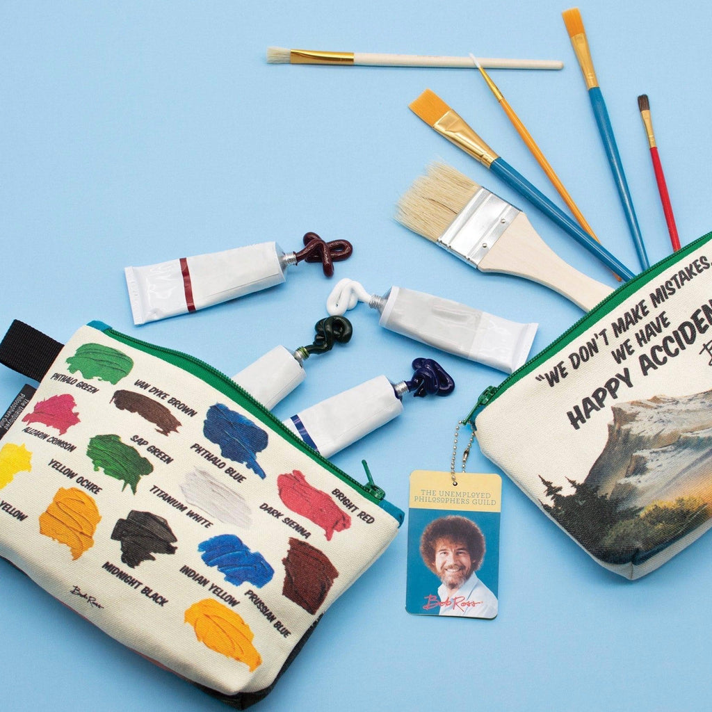 Bob Ross Zipper Bag on table with paint supplies.