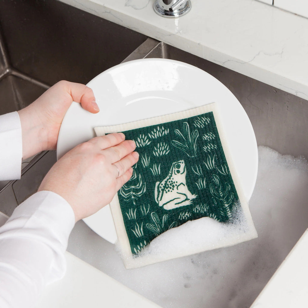 Boundless Swedish Dishcloth being used to wash dishes.