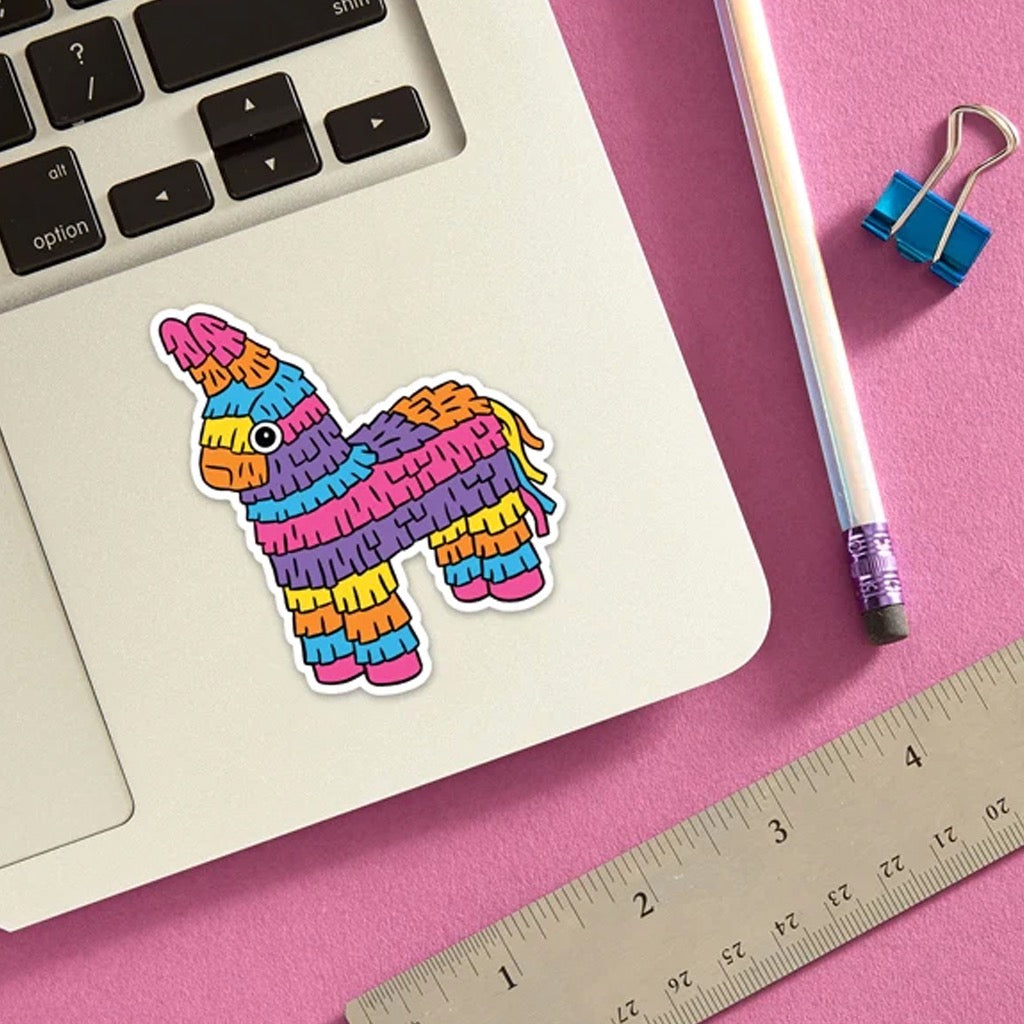 Caballito Piñata Die Cut Sticker on computer.