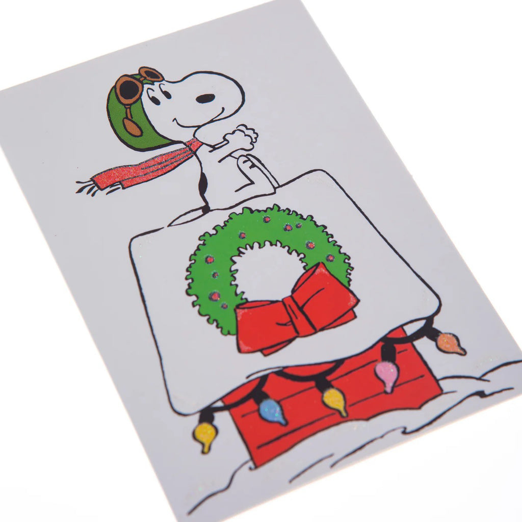 Card with Snoop on Christmas doghouse.